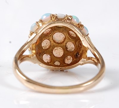 Lot 2509 - A 9ct yellow gold and opal bombe ring,...