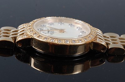 Lot 2518 - A lady's gold plated Eligio diamond set dress...