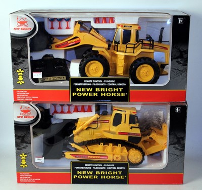 Lot 1015 - Two boxed as issued Newbright Radio Controlled...