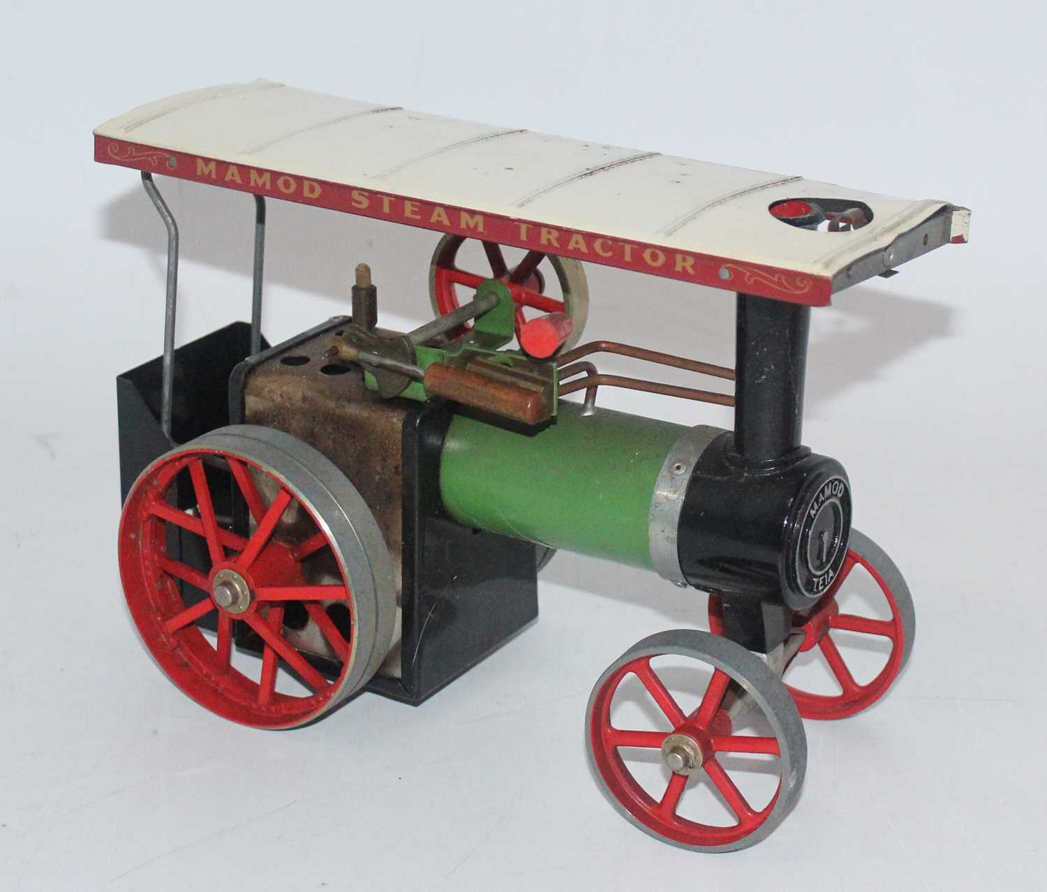 Lot 16 - A Mamod steam tractor, would benefit from...