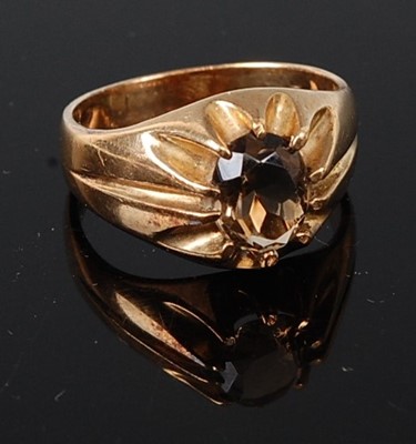 Lot 314 - A 9ct yellow gold brown topaz dress ring,...