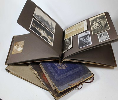 Lot 413 - Four albums of Edwardian and later photographs...