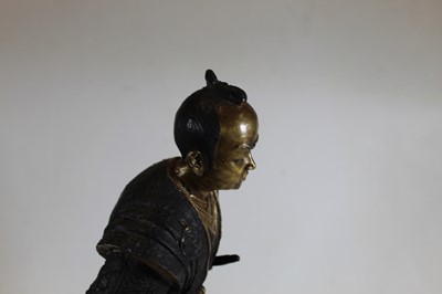 Lot 5 - A hollowcast bronzed metal figure of a...