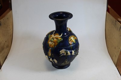 Lot 7 - A Chinese style pottery vase, on a blue ground,...