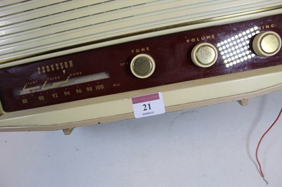 Lot 21 - A 1950s Ferguson radio, housed in a beige...