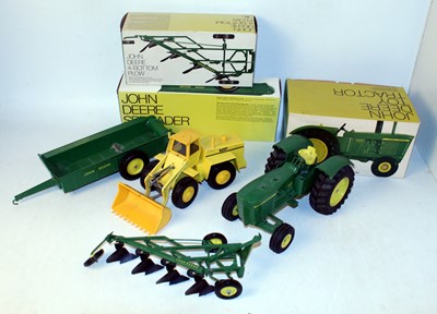 Lot 906 - An ERTL and Gama John Deere tractor and Massey...