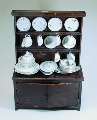 Lot 116 - A 20th century child's stained beech dresser,...