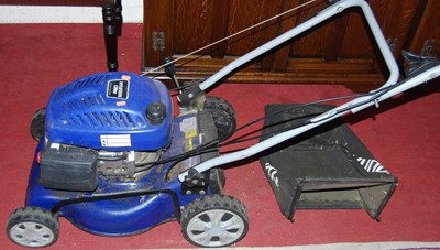 Lot 1087 - A Hyundai 139cc petrol driven lawn-mower, with...