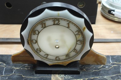 Lot 82 - An Art Deco marble cased mantel clock, the...