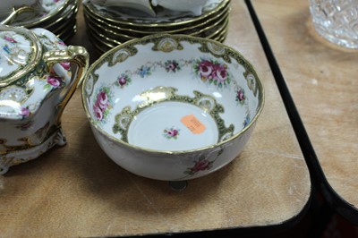 Lot 91 - An early 20th century continental porcelain 12...