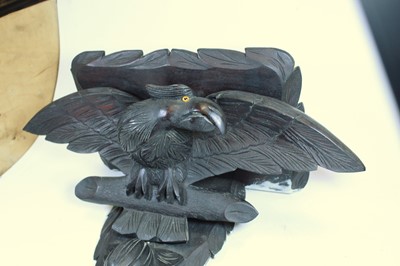 Lot 96 - A Victorian style ebonised wall bracket carved...