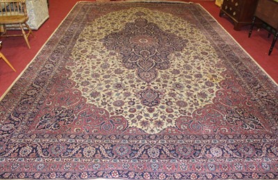 Lot 1101 - A large Persian woollen cream ground Tabriz...