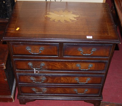 Lot 1117 - A reproduction mahogany small chest of two...