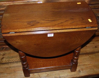 Lot 1134 - A contemporary joined oak small low dropflap...