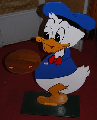 Lot 1135 - A painted hall stand in the form of Donald...