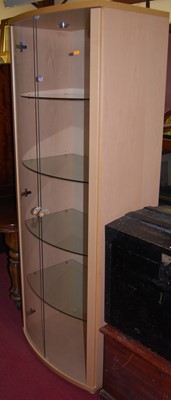 Lot 1140 - A contemporary beech double door glazed...