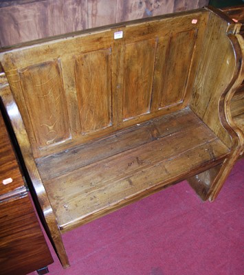 Lot 1148 - A stained planked pine four panelled...