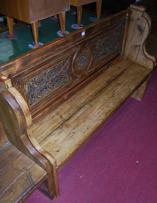 Lot 1149 - A stained planked pine panelled back...