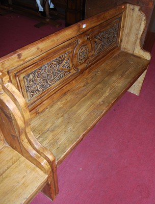 Lot 1150 - A stained planked pine panelled back...