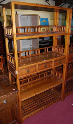 Lot 1158 - A Chinese stained pine freestanding display...