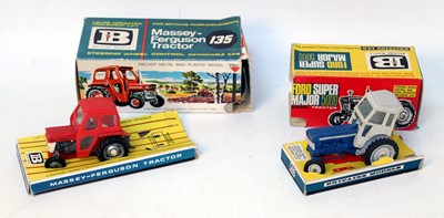 Lot 910 - A Britains boxed tractor group, both examples...