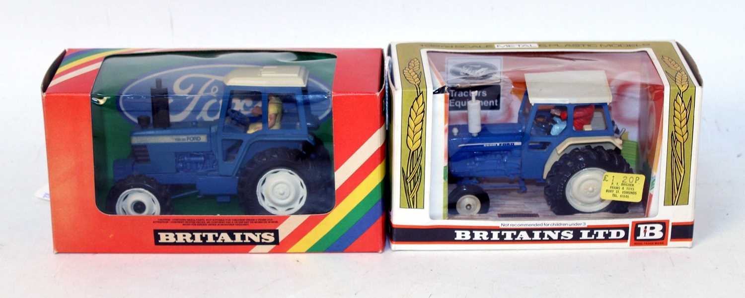 Lot 913 - A Britains boxed tractor group to include a No....