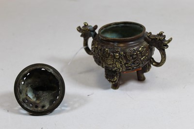 Lot 183 - A modern Chinese bronzed koro, the pierced...
