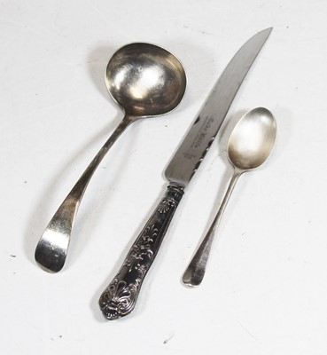 Lot 203 - An early 20th century silver sauce ladle;...