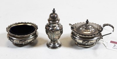 Lot 238 - An Edwardian silver three-piece cruet,...
