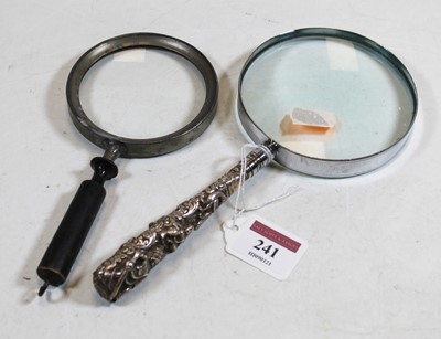 Lot 241 - A large magnifying glass, the white metal...