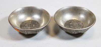 Lot 242 - A pair of Chinese white metal shallow bowls,...