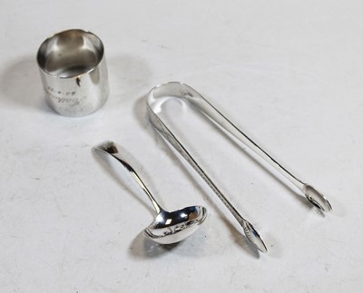 Lot 263 - A modern silver sifting spoon; together with a...