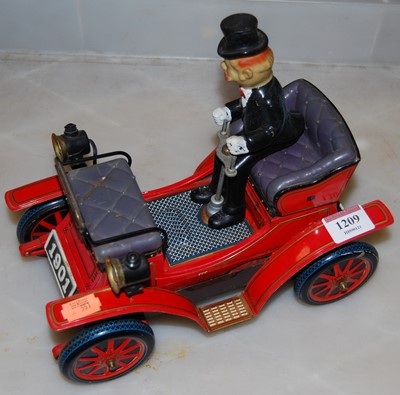 Lot 1209 - A 20th century battery operated tinplate car...