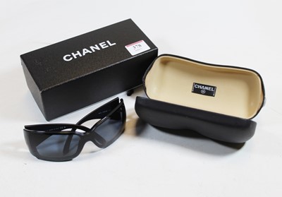 Lot 378 - A pair of Chanel sunglasses, in original box