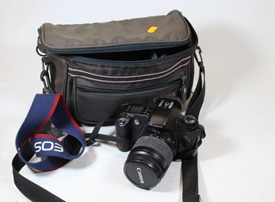 Lot 399 - A Canon E05 500 camera, in carrycase, with...