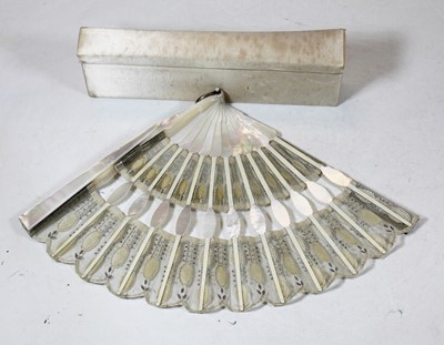 Lot 400 - A French fan, having mother of pearl sticks,...