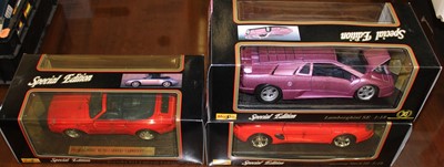 Lot 1328 - Three Maisto 1:18 scale boxed models, to...