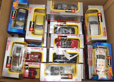 Lot 1329 - A quantity of Burago 1:43 scale boxed models,...