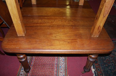 Lot 1193 - A Victorian walnut extending dining table, the...