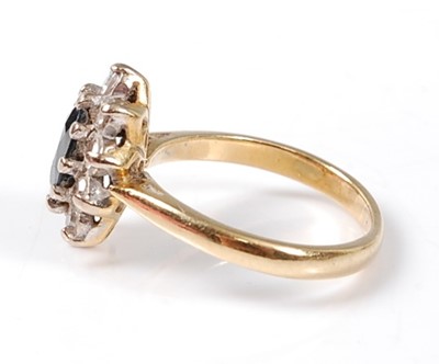 Lot 2530 - An 18ct yellow and white gold, sapphire and...