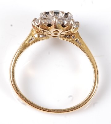Lot 2530 - An 18ct yellow and white gold, sapphire and...