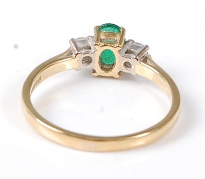 Lot 2522 - An 18ct yellow and white gold, emerald and...