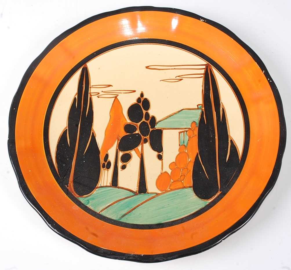 Lot 4 - A Clarice Cliff Orange Trees and House pattern...