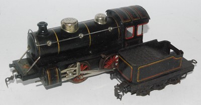 Lot 403 - A continental outline 0-4-0 engine and tender...