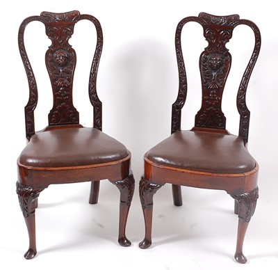 Lot 1379 - A pair of Queen Anne walnut dining chairs,...