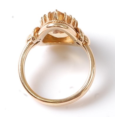 Lot 1181 - A yellow metal citrine dress ring, featuring a...