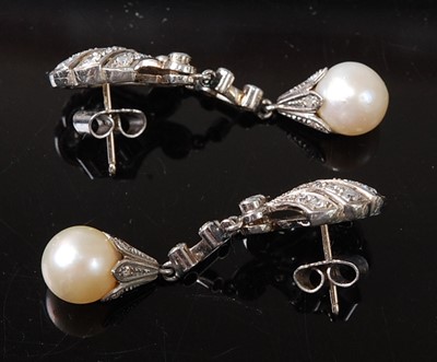 Lot 1215 - A pair of white metal Art Deco style pearl and...