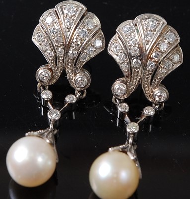Lot 1215 - A pair of white metal Art Deco style pearl and...