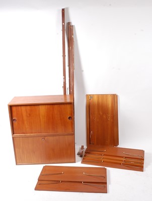 Lot 365 - A 1960s teak wall-mounted modular unit,...