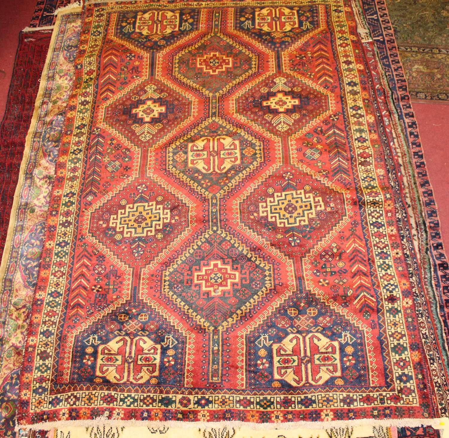 Lot 2 - * An Afghan woollen Shirvan rug, the red...